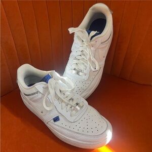 White Nike court visions with blue detail